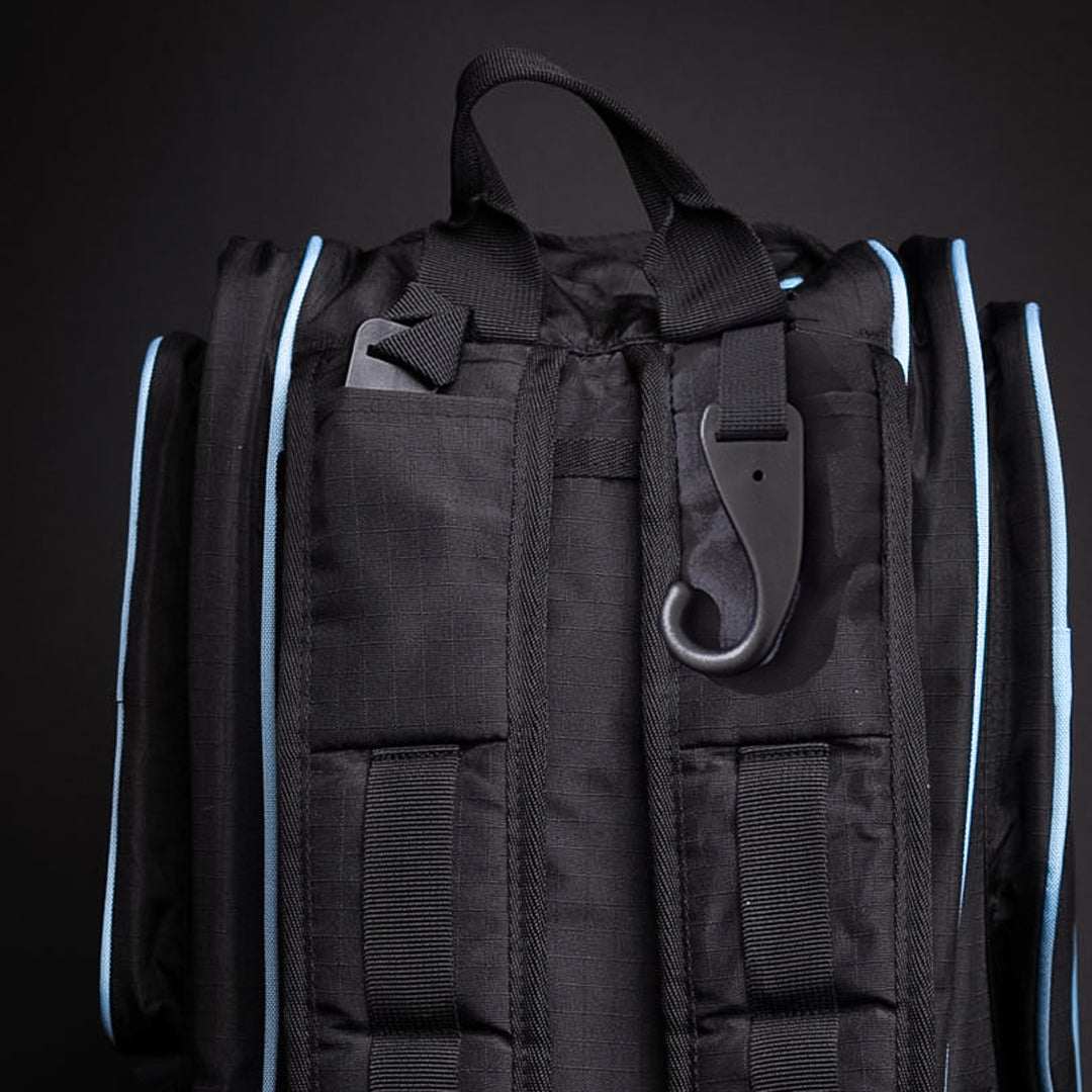 FLiK Team Pickleball Backpack in stealth black with electric cyan accents, featuring multiple compartments and waterproof fabric for tournament players