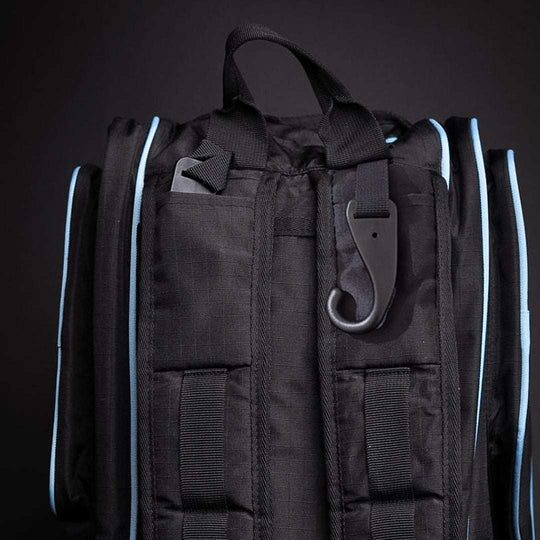 FLiK Team Pickleball Backpack in stealth black with electric cyan accents, featuring multiple compartments and waterproof fabric for tournament players
