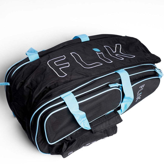 FLiK Team Pickleball Backpack in stealth black with electric cyan accents, 45L waterproof capacity, multiple compartments, and heavy-duty YKK zippers.