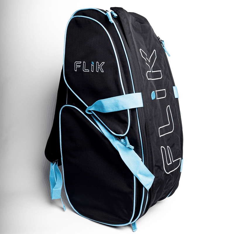 FLiK Pickleball bag in stealth black with electric cyan accents, showing spacious compartments and durable waterproof material