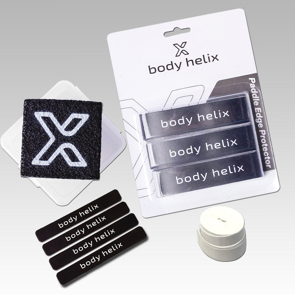 Body Helix paddle edge guard tape, paddle weights, overgripm and eraser with packaging on a gray background
