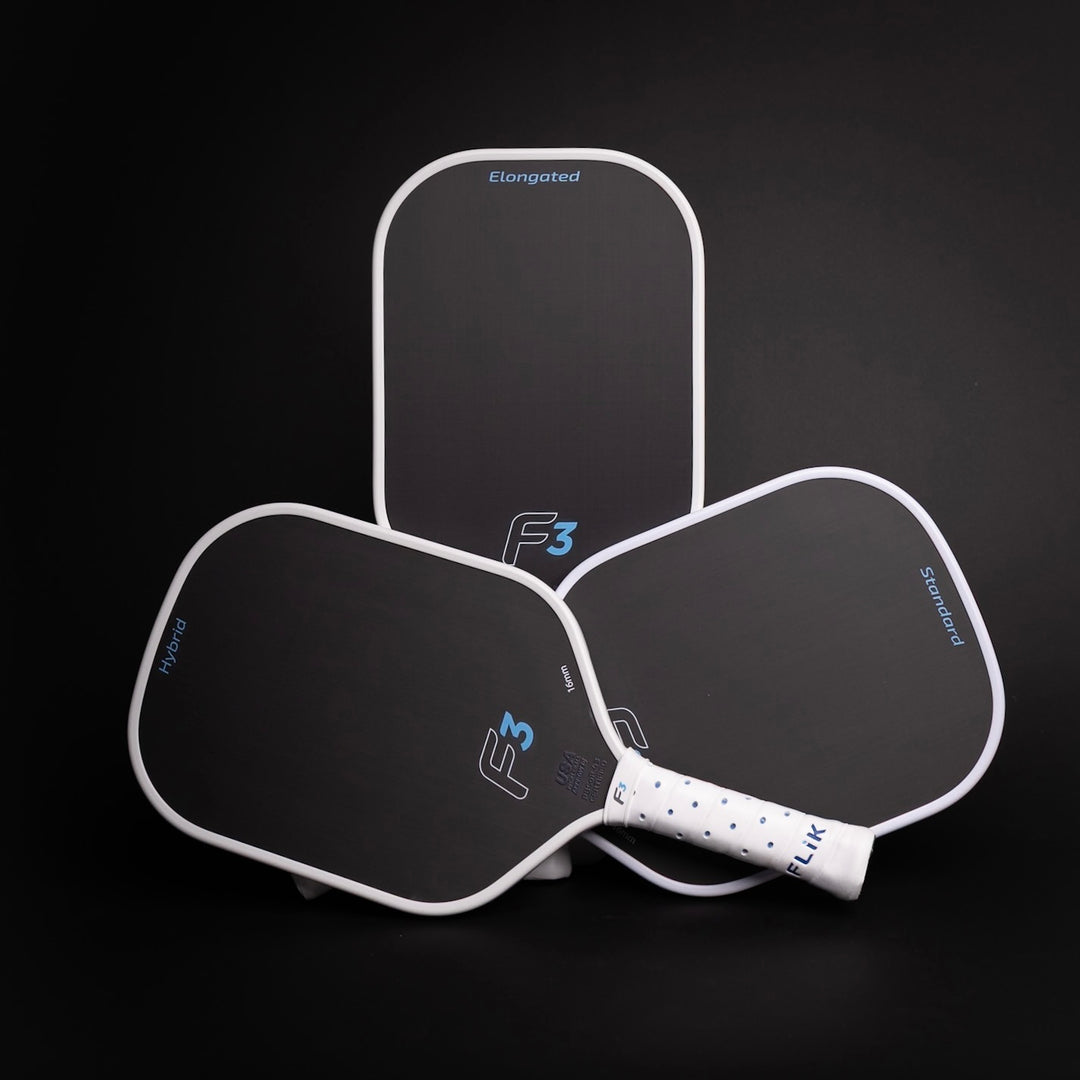 Two pickleball paddles with 'Elongated' branding on a black background