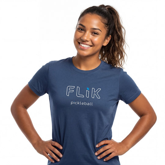 Woman wearing a blue 'Flik pickleball' t-shirt on a white background