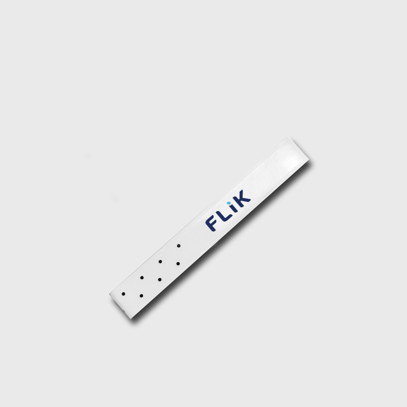 A white Paddle Replacement Grip with the brand name 'FLIK' printed in blue, shown diagonally on a light gray background.